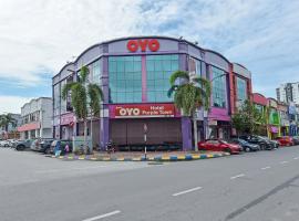 OYO 880 Hotel Purple Town，位于适耕庄的酒店