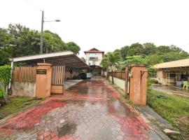 OYO 90915 Ilham Villa，位于Kampong Binjai的酒店