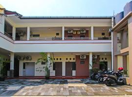 Super OYO 92437 Wahidin Guesthouse，位于北加浪岸的酒店