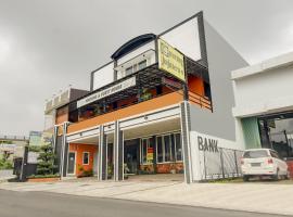 Capital O 90151 Guest House 180，位于巴图的酒店