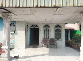 SPOT ON 92697 Ani Nur Homestay Syariah，位于棉兰的酒店