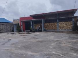 OYO 93152 Azwa Gh Katingan Near Lapangan Sepak Bola Pegatan Hilir，位于Pagatan的酒店