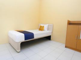 SPOT ON 2830 Azka Guest House Syariah，位于芝拉扎的酒店