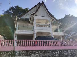 Hotel O Penginapan & Villa Sirait，位于巴拉巴特的酒店