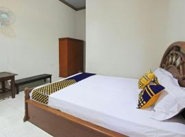SPOT ON 92973 Madani Syariah Guesthouse，位于萨萨克的酒店