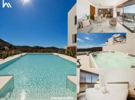 Modern penthouse with two terraces, jacuzzi and sea, lake and mountain views, in Almazara Hills，位于伊斯坦的酒店