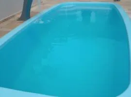 Casa e Área de lazer em Rubião Júnior