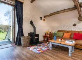 Ravendale, Kirkoswald in a rural setting with wood burning stove