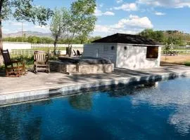 The Ranch House with a Pool Hot Tub and Fire Pit