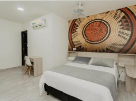 Hotel Plataneras Caney，位于Turbo的酒店
