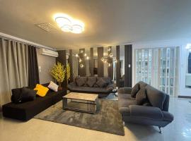 Mango Oasis 2 - Cozy flat house with billiard，位于奥隆阿波的酒店