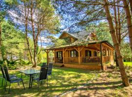 Ferienhaus "Maga" am See Walpusz- mit gratis Kajak, Kamin & Hunde willkommen，位于Wałpusz的酒店