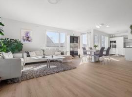 A cozy three bedroom apartment for rent，位于Heimdal的酒店