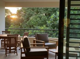 Arbre a pain Beach Lodge，位于普纳奥亚的酒店