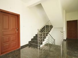 Hotel O Vattekad Residency，位于卡卡纳德的酒店