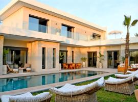 Villa magnifia avec piscine à 20 min de Marrakech - ARK Realty，位于Sraghna的酒店