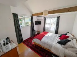 Sleepout with bathroom and mini kitchenette