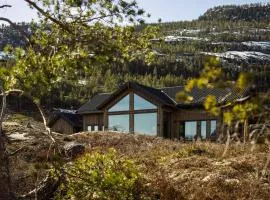 Villa Lakehouse Moss with sauna, boat & jacuzzi