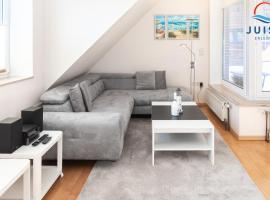 Haus Hahntje 192 - Wohnung Sonnenwinkel，位于于斯德的低价酒店