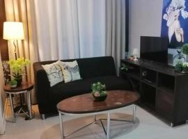 Royale 2BR Condo unit with free WiFi，位于伊穆斯的酒店