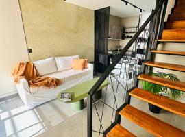 LOFTIER COSTANERA Depto 402，位于波萨达斯的酒店