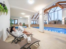 Kaniówka Ski Resort- relaks w górach z basenem, sauną i jacuzzi，位于Białka Tatrzanska的酒店