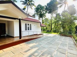 Pragathi Homestay，位于玛纳多迪的带停车场的酒店