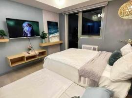 20th floor Studio with 2 BEDS,Hi-Speed WIFI, NETFLIX,WIFI,YTpremium,Games,Washer,Kitchen,HIghFloor,BALCONY，位于圣费尔南多的公寓式酒店