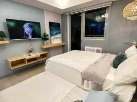 20th floor Studio with 2 BEDS,Hi-Speed WIFI, NETFLIX,WIFI,YTpremium,Games,Washer,Kitchen,HIghFloor,BALCONY，位于圣费尔南多的公寓式酒店