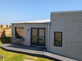 Modern Eco-Lodges near Findhorn Beach