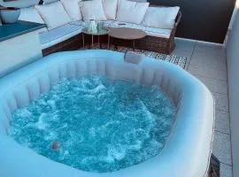 Jacuzzi area with sunset, terrace, free parking