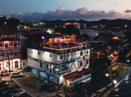 Hotel La Union，位于弗洛勒斯马雅世界国际机场 - FRS附近的酒店