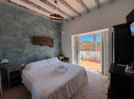 Boutique Hostal La Curandera de Salinas，位于伊维萨镇的酒店