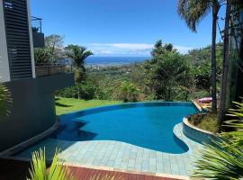 Tahiti Apartment condo 1 bedroom pools Faaa，位于帕皮提的酒店