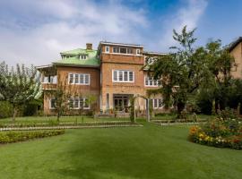 SaffronStays Awakening Deluxe Rooms，位于斯利那加的酒店