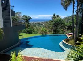 Tahiti Apartment condo 1 bedroom pools Faaa，位于帕皮提的酒店