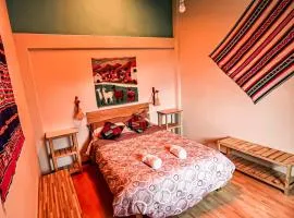 Casita con cocina privada, patio y jardin