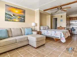 Studio with modern kitchen, one block to beach, boardwalk, and has a pool!