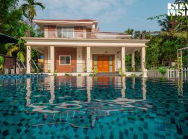 StayVista at 27 Flora with Lawn, Pool, WiFi，位于纳加奥恩的酒店