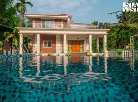 StayVista at 27 Flora with Lawn, Pool, WiFi