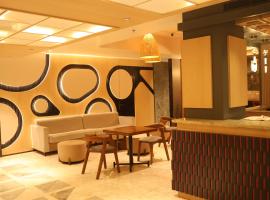 Hotel Four Natives，位于Tinsukia的酒店