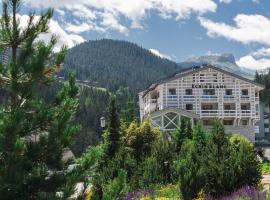Ecrin Blanc Resort Courchevel - Aquapark，位于谷雪维尔的酒店