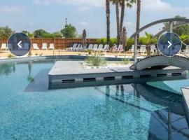 Mobil home 3 chambres , camping 4 étoiles Le Grau du roi，位于勒格罗-迪鲁瓦的酒店