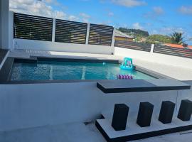 Coconut Breeze SVG - 1 bdrm，位于Argyle International Airport的旅馆