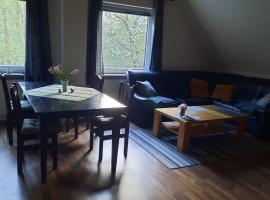 Ferienwohnungen an der Schusteracht Dachgeschoss und Souterrain，位于基尔的酒店