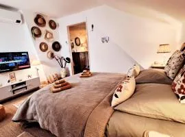 COSY CHAMBRE-SUITE climatisée