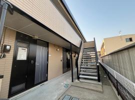 apartment hotel myu 郡山，位于郡山的带停车场的酒店