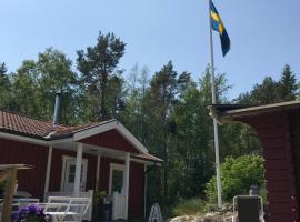 Charmigt hus i Skärgården, en bussresa från City，位于韦姆德的酒店