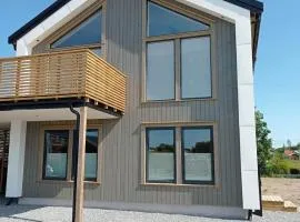 Cozy apartment in a new house in Grimstad