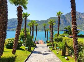 Apartment direkt am Luganersee，位于比索内的带泳池的酒店